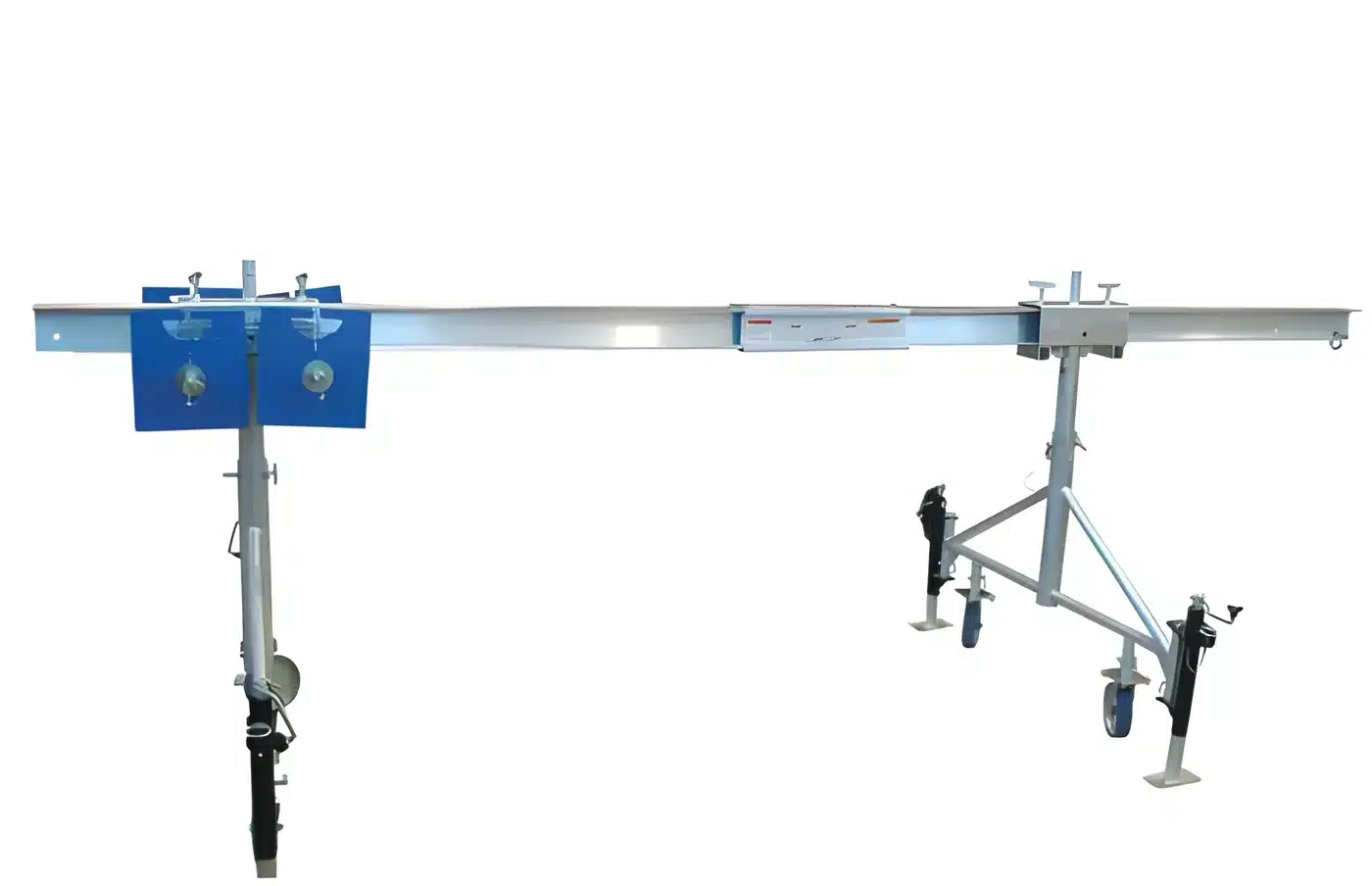 Representative roof-rigging beam with support stands and counterweights.