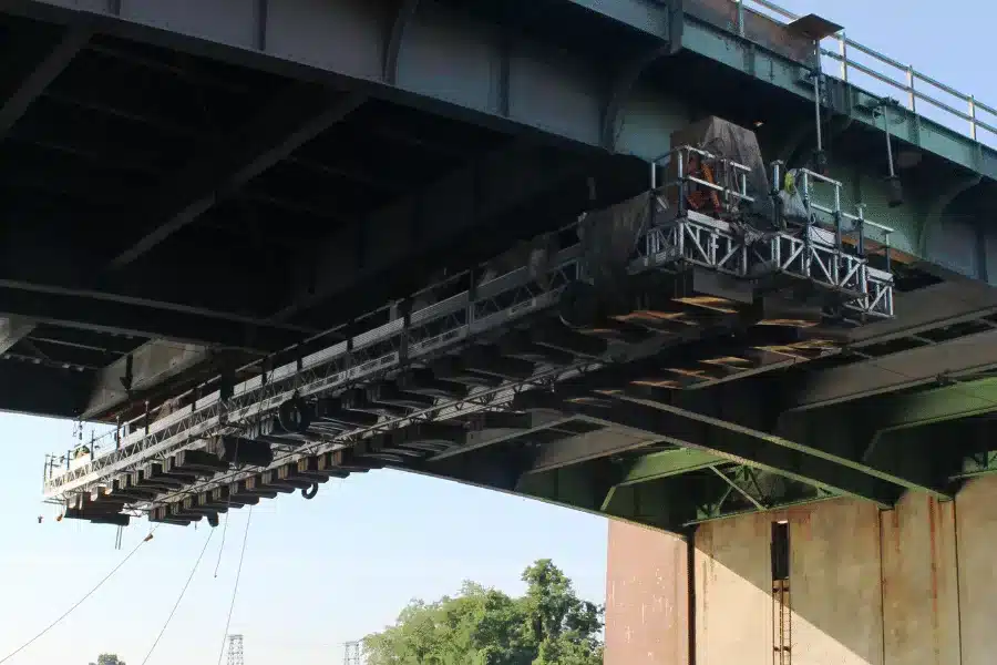 SCAS suspended access platform beneath a bridge