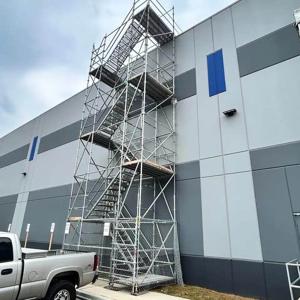 Scaffold stair tower alongside a building on an SCAS project.
